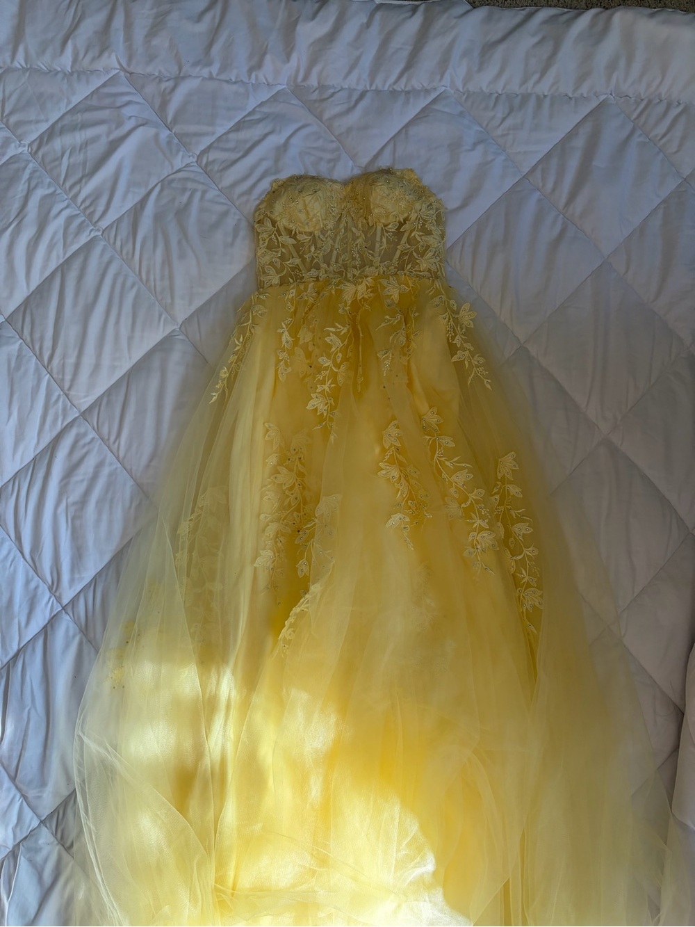light Yellow Strapless prom dress with floral embroidery and lace.